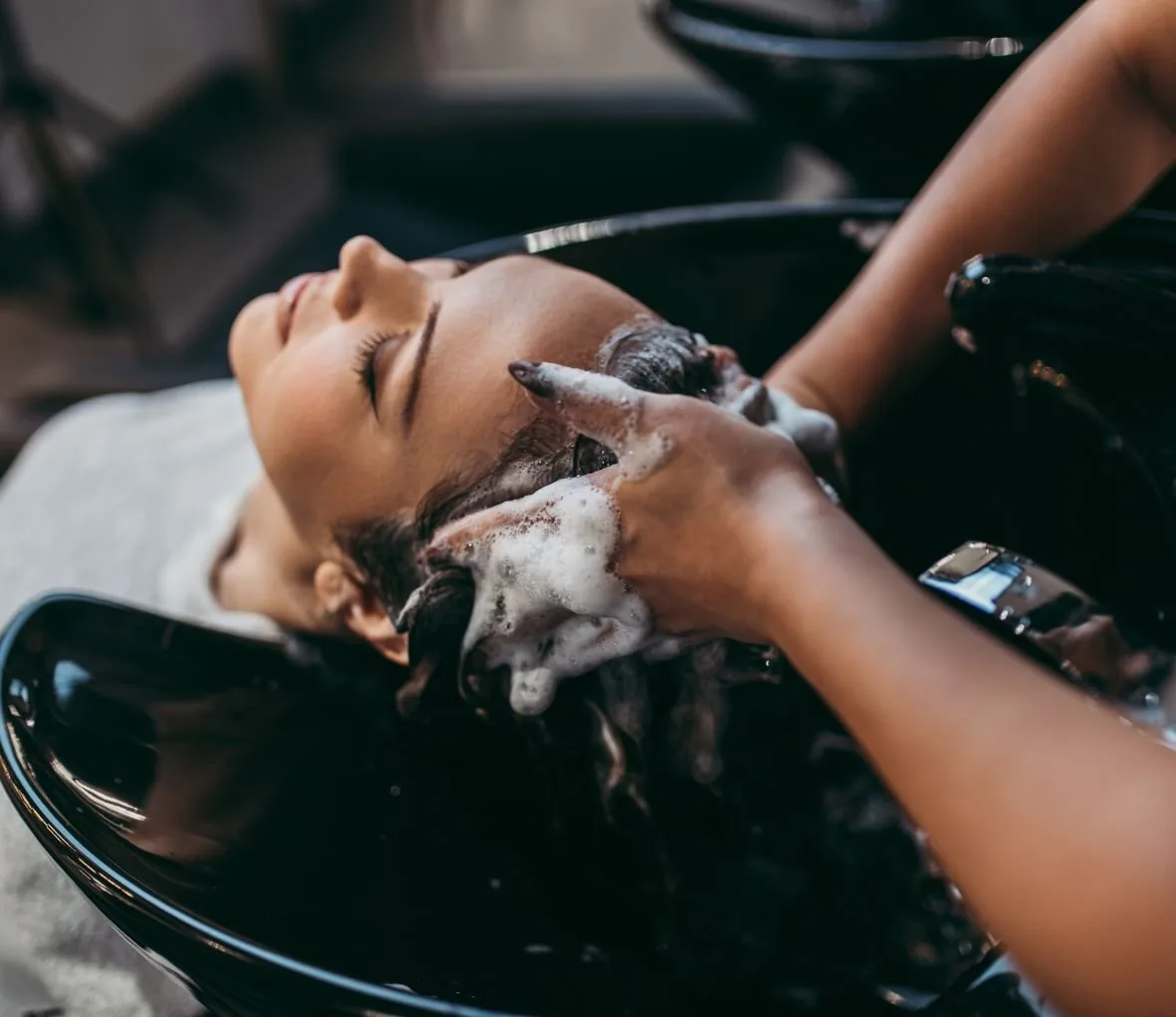 A shampoo and scalp massage at the wash station
